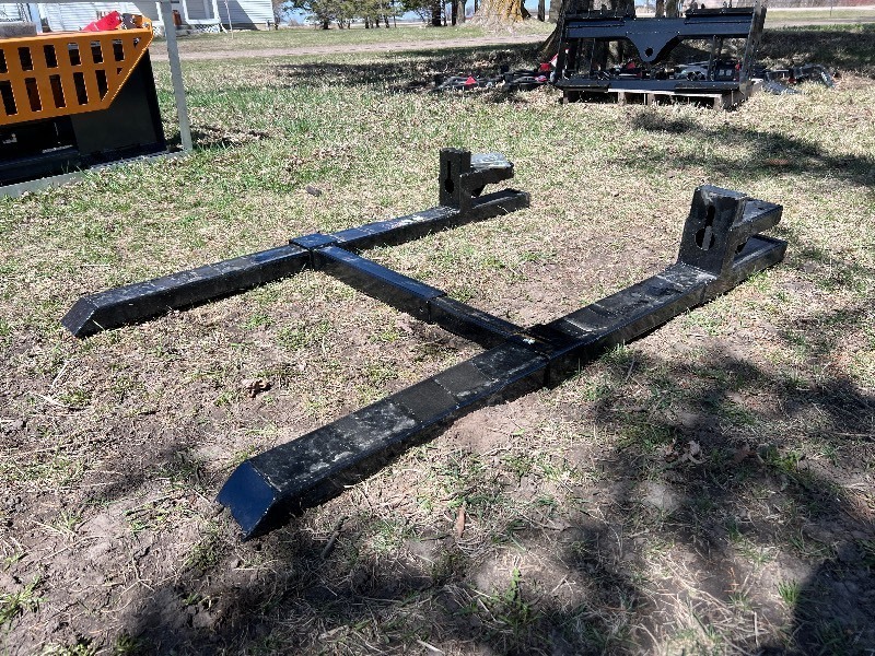 lot 8021 image: Wolverine Clamp-On Pallet Forks w Adjustable Stabilizer Bar (TF1-66-4000G)