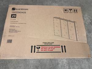 lot 22 image: Glacier Bay 48 X 31 Tri-View Mirror Cabinet