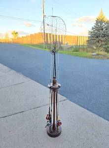 lot 102 image: Great Looking Display Rack wFishing Rods & Vintage Fishing Net