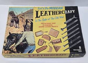 lot 131 image: Neat old Western Leather Kit wTools