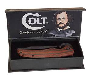 lot 46 image: COLT  Blood Stripe Micarta Knife  in display box  Model CT540