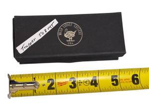 lot 49 image: Wild Turkey Cutlery  3-34 Trapper Knife with Brown Swirl Resin handle