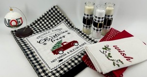 lot 27 image: Kringle Farms Christmas Decor Set Towels, Ornament, Candles 