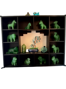 lot 34 image: Collection of Green Carved Animal Figurines with Display Shelf