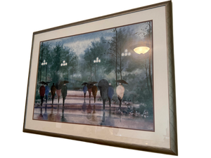 lot 68 image: Large Framed Art Print of Figures with Umbrellas in a Park