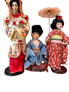 lot 106 image: Grouping of Three Large Porcelain Asian Cultural Dolls