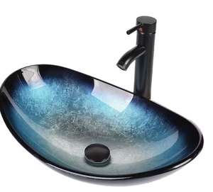 lot 66 image: BOAT SHAPE BLUE GLASS VESSEL SINK