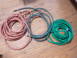 lot 26 image: 3 Garden Hoses