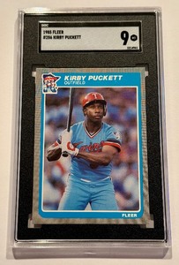 lot 7 image: Kirby Puckett RC SGC 9 Mint 1985 Fleer #286 Rookie Vintage Minnesota Twins Baseball Card