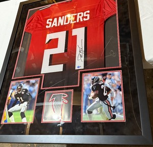 lot 6B image: Deion Sanders Signed, Framed, and Matted Jersey With Photos and Beckett COA Atlanta Falsons Football