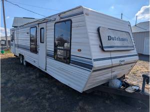 lot 7 image: 1992 Dutchman Camper Trailer