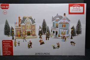lot 103 image: Holiday Time 20-Piece Lighted Village Set with Buildings and Accessories