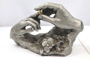 lot 38 image: Austin Sculpture by Fisher, Hands with Ring, 1986 Modern Cast Art