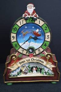 lot 124 image: Christmas Countdown Clock with Santa and Snow Village, Boxed