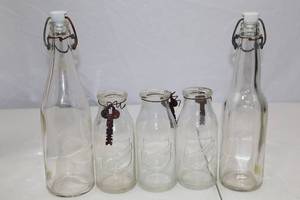 lot 74 image: Vintage Glass Milk Bottles and Swing Top Bottles Lot