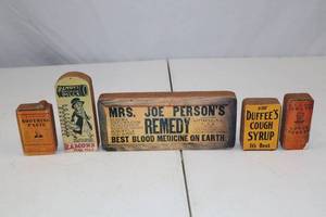 lot 85 image: Set of Vintage Advertising Medicine Block Replicas