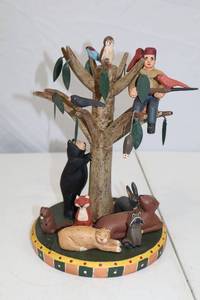 lot 89 image: Folk Art Wood Carving Tree of Life by Randy Tate, 10 Inches Tall