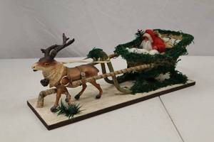 lot 160 image: Vintage Christmas Santa Sleigh and Reindeer Figurine Decoration