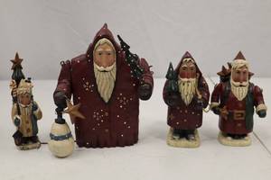 lot 165 image: Set of 4 Hand-Painted Wood Santa Christmas Figurines