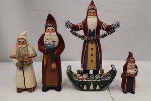 lot 178 image: Set of 4 Santa Christmas Figurines Signed Tate, 13 to 6 Inches Tall
