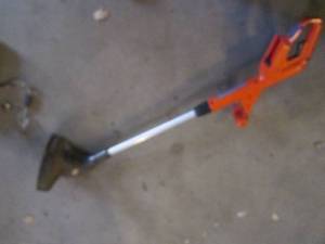 lot 366 image: Black and Decker cordless weed eate...