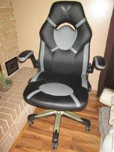 lot 7 image: Gray and black leather style padded...