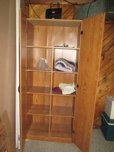lot 79 image: Wood grain style 2-door pantry cabi...