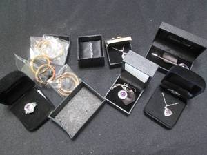 lot 123 image: Platinum plated necklace, pin and r...