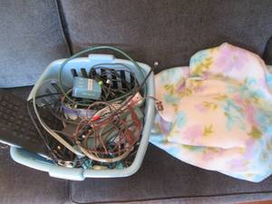 lot 129 image: Small laundry basket of cords, cabl...