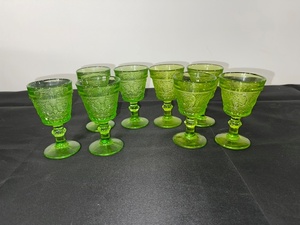 lot A-62 image: Set of 8 Green Depression  Pressed Glass Goblets with Decorative Pattern