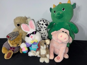 lot 71 image: Lot of 7 Plush Toys Including Boyds Bear, Percy the Singing Pig, and Dancin Bunny