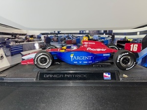 lot 78 image: Danica Patrick Argent Pioneer #16 IndyCar Diecast Model with Display Stand