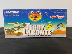 lot 84 image: Terry Labonte #5 Monte Carlo 400 124-Scale Diecast Stock Car with Looney Tunes Graphics