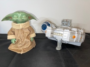 lot 90 image: Star Wars Grogu Figure and Millennium Falcon Toy Vehicle Set