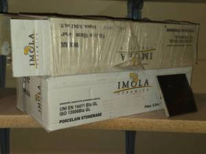 lot 519 image: Lot of (2 Boxes) Ceramic Tile 14 x 4 x 4 84-count ( 168 total items )