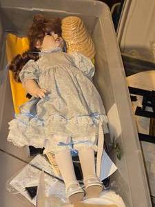 lot 576 image: fix size Collectible Doll with Bin of Doll Clothes