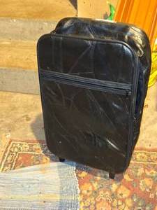 lot 582 image: Rolling Suitcase