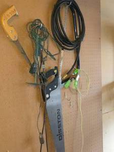 lot 640 image: Hand Saws, Tree Saw, Extension Cords, Hose, Spring Camp