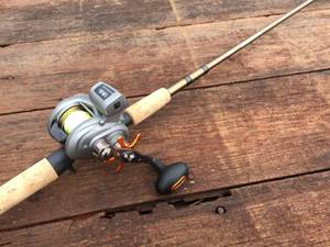 lot 209 image: OKUMA DeadEye Pro Fishing Rod with OKUMA Baitcast Reel