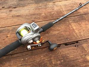 lot 210 image: OKUMA Classic Pro Fishing Rod with OKUMA Baitcase Reel