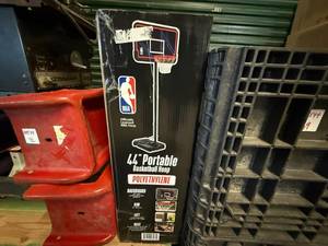 lot 77 image: 44 NBA Portable Basketball Hoop