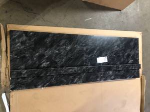 lot 14 image: Hampton Bay 6 ft. Straight Laminate Countertop All-Inclusive Kit in Textured Sombra with Eased Edge and Loose Backsplash Damaged Customer Returns See Pictures