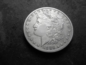lot 4 image: 1886 O Morgan Silver Dollar