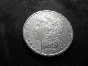 lot 6 image: 1887 S Morgan Silver Dollar