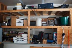 lot 225 image: Contents of Shelves - Bar Clamps, Sporting Goods, Cameras, Tools