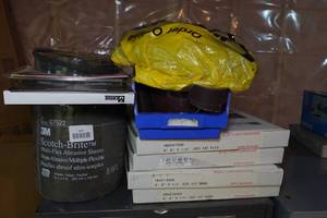 lot 107 image: Band Saw Blades, Belt Sander Paper, Grinder Wheels