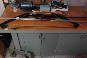 lot 97 image: Aluminum Recurve Bow, Indian Stalker Compound, Arrows with Leather Bag