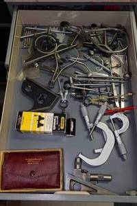 lot 65 image: Contents of Drawer - Lufkin Rule Set, Micrometers, Starrett Planer Gage