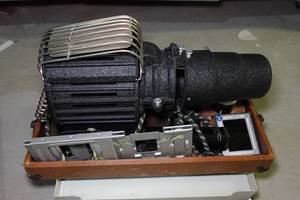 lot 61 image: Antique Projector in Case and Dolly