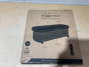 lot 264 image: Baby Delight Snuggle Nest Bassinet, Portable Baby Bed, for Infants 0  5 Months, Driftwood Grey